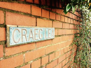 Craig Lea name plaque in front of English house
