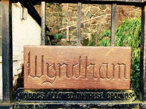 'Wyndham' name plaque on front gate of English house