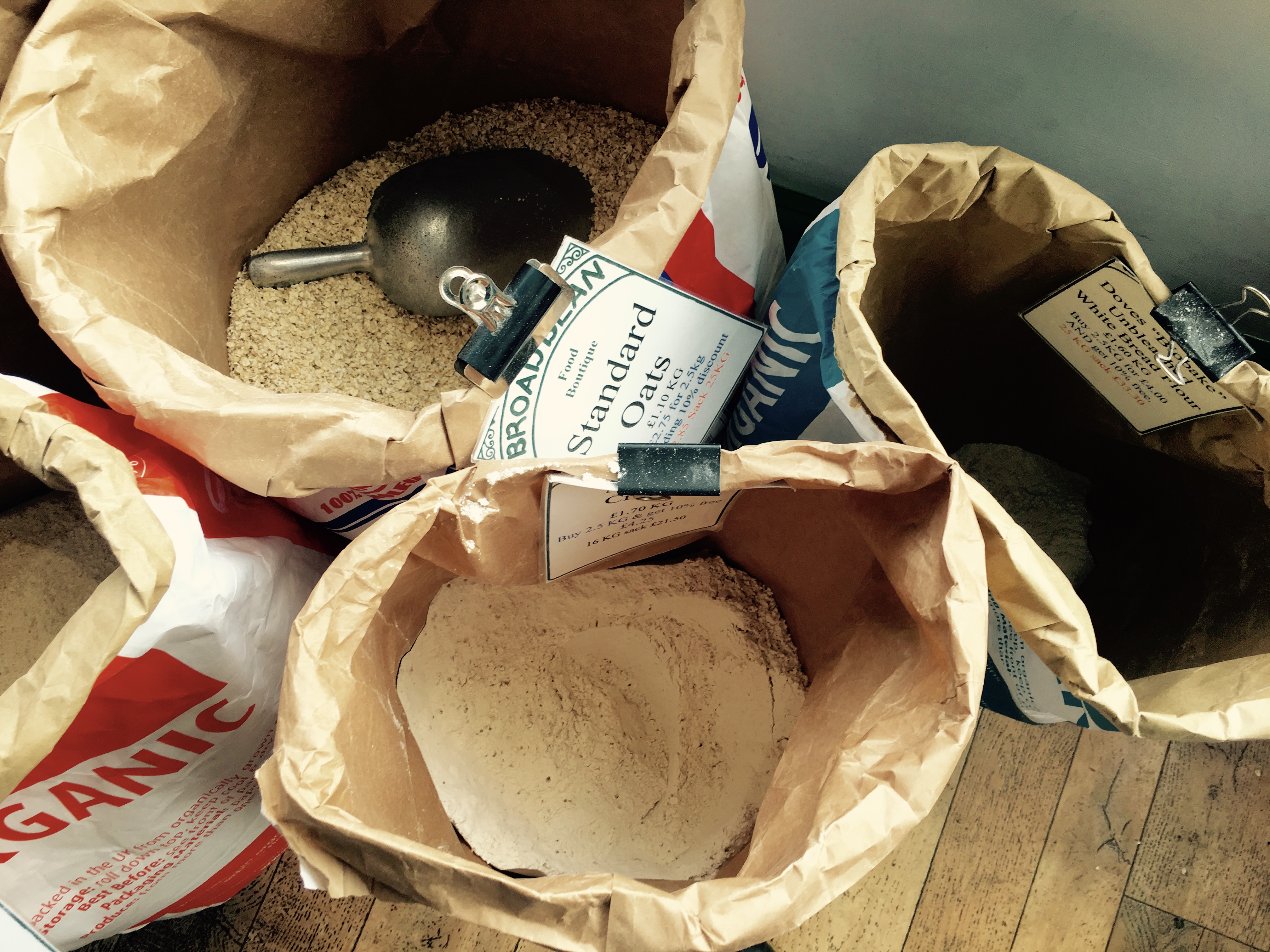 Bags of flour and oats at a providores shop in Ludlow, Shropshire