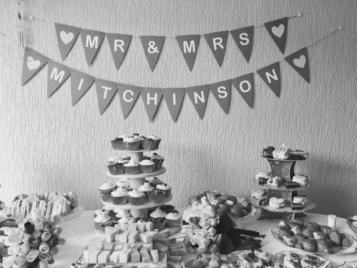 Bunting and food at a wedding reception.