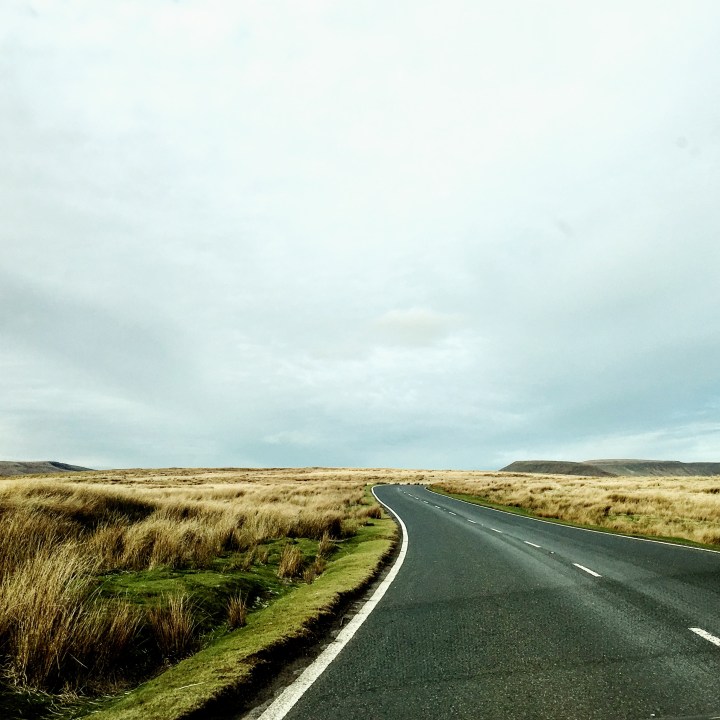 Road winding through the Brecon Beacon National Park, in Wales.