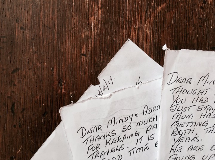 Handwritten notes on timber table.