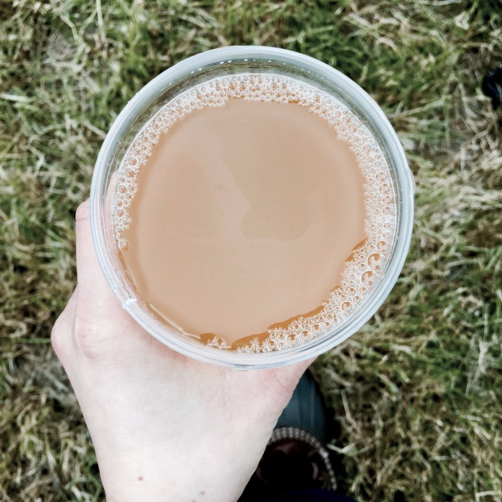English cider in a plastic cup