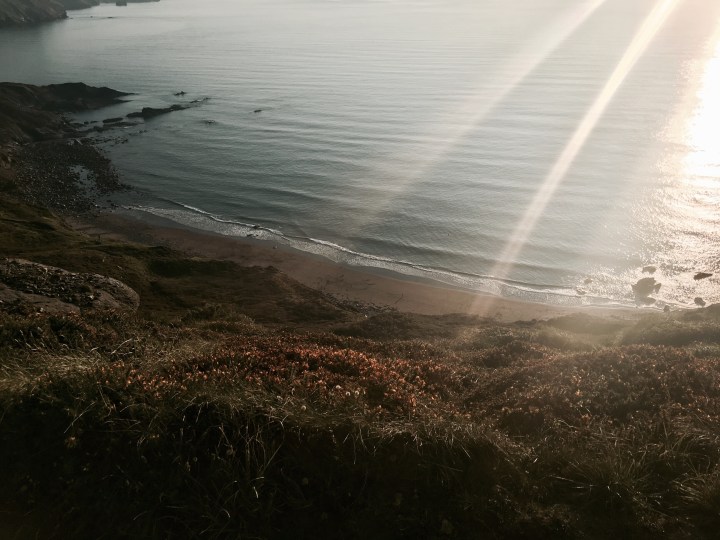 Looking down on The Strangles beach in Cornwall, England.