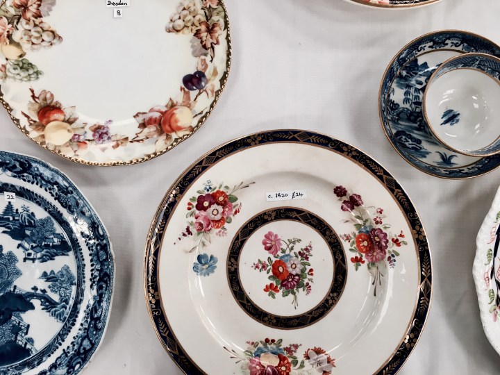 Plates displayed at a flea fair in Malvern, Worcestershire, England.