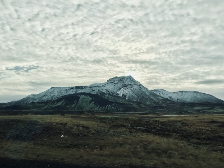 Snow covered mountain between Keflavik and Reykjavik, Iceland.