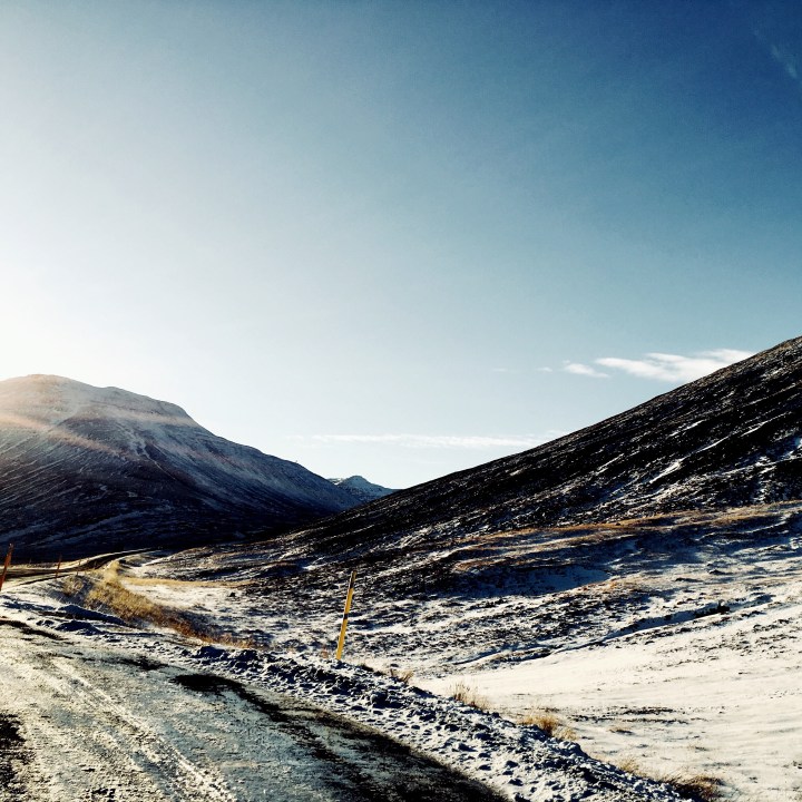 Snowy mountains near Bakki, Iceland.