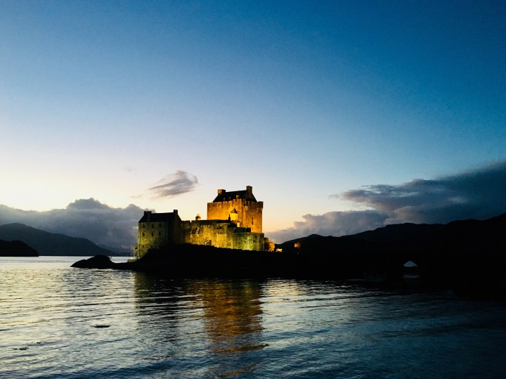 Eilean Donan castle in Scotland at dusk.