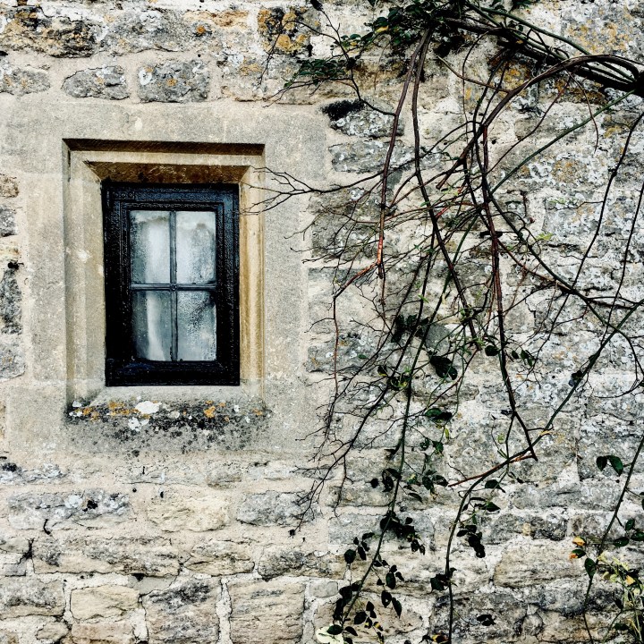 Window of cottage in Arlington Row, Bibury, Gloucestershire.