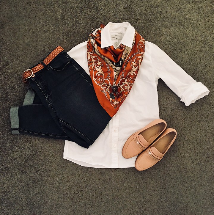 Black jeans, white shirt, nude loafers and tan silk scarf.
