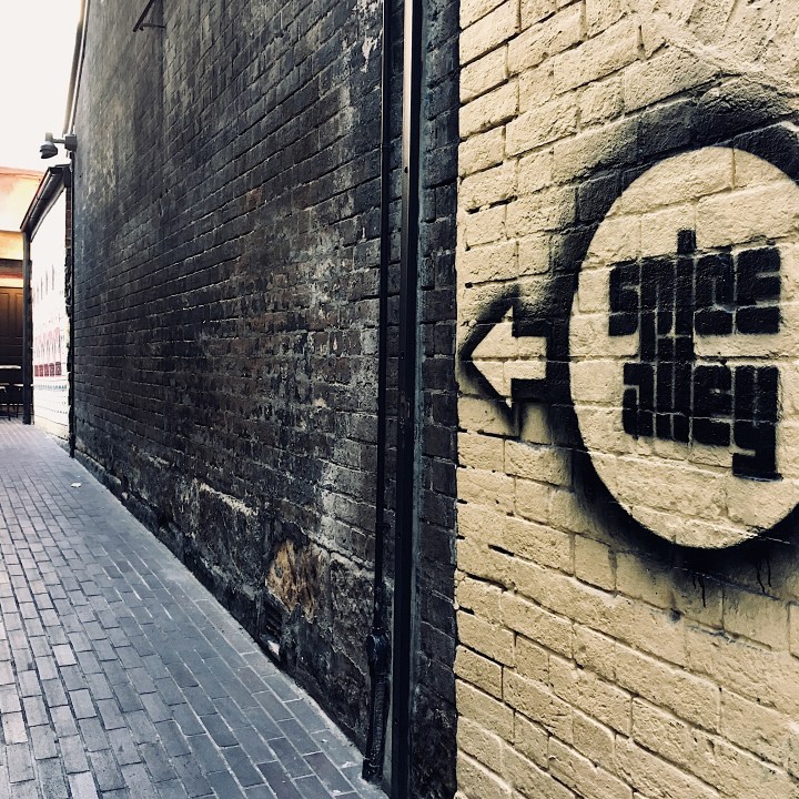 Graffiti sign for Spice Alley, Chippendale, New South Wales, Australia.