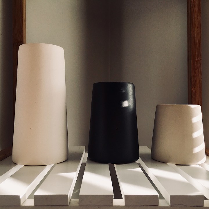 Set of three Country Road vases in white, black and taupe.