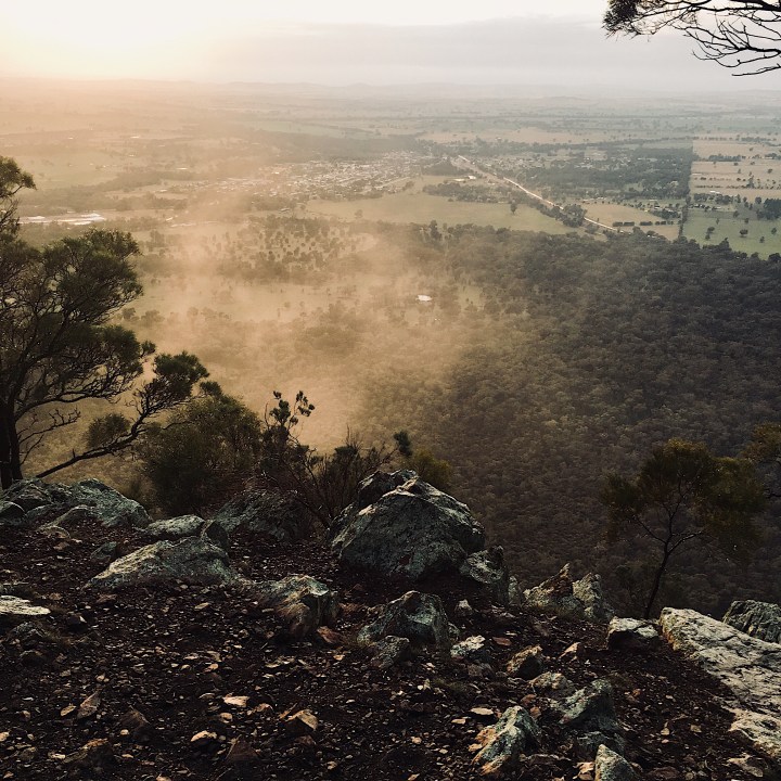 Early morning mist swirls around The Rock, New South Wales, Australia.