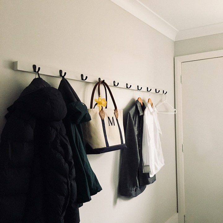 Coat rack in laundry.