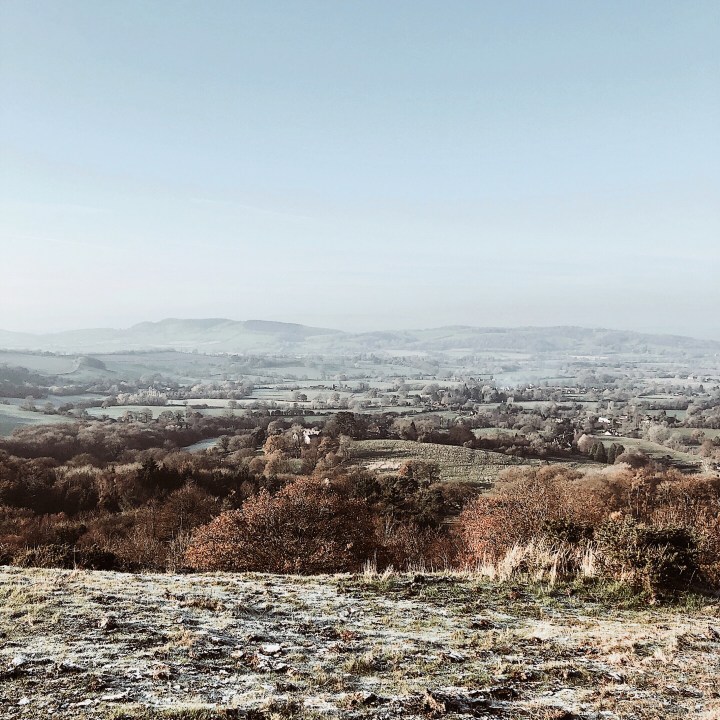 Looking out towards Herefordshire atop a frosty Malvern Hills in Worcestershire, England.