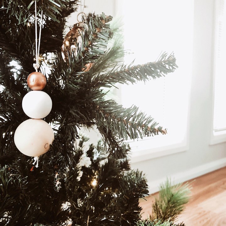 Simple bauble hanging on Christmas tree.