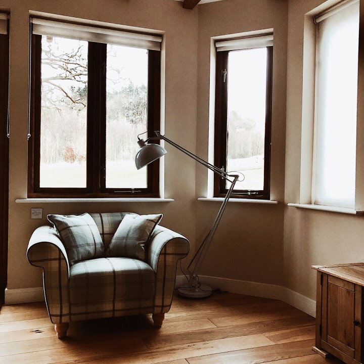 Checked sofa in sitting room.