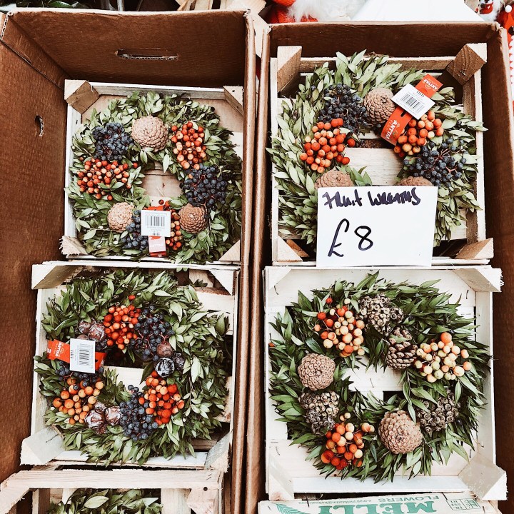 Christmas wreaths for sale at the Worcester Christmas Fayre, England.