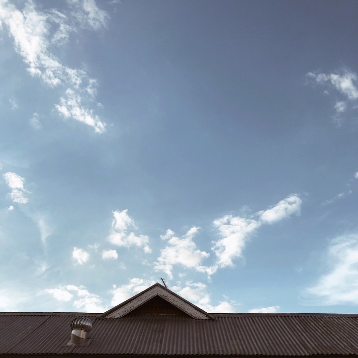 Tin roof and blue sky in Wagga Wagga, New South Wales, Australia.