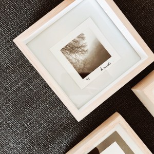 Framed black and white photograph.
