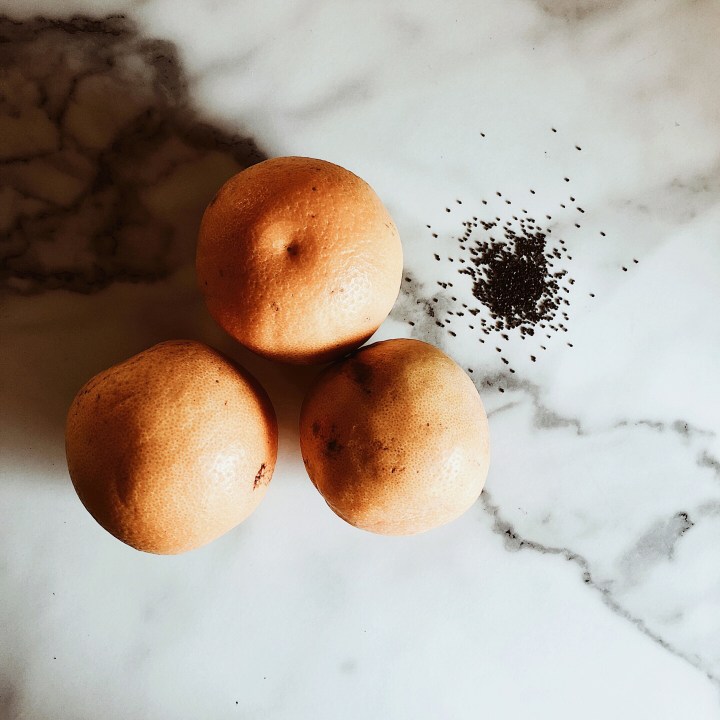 Three homegrown oranges and a handful of poppyseeds.