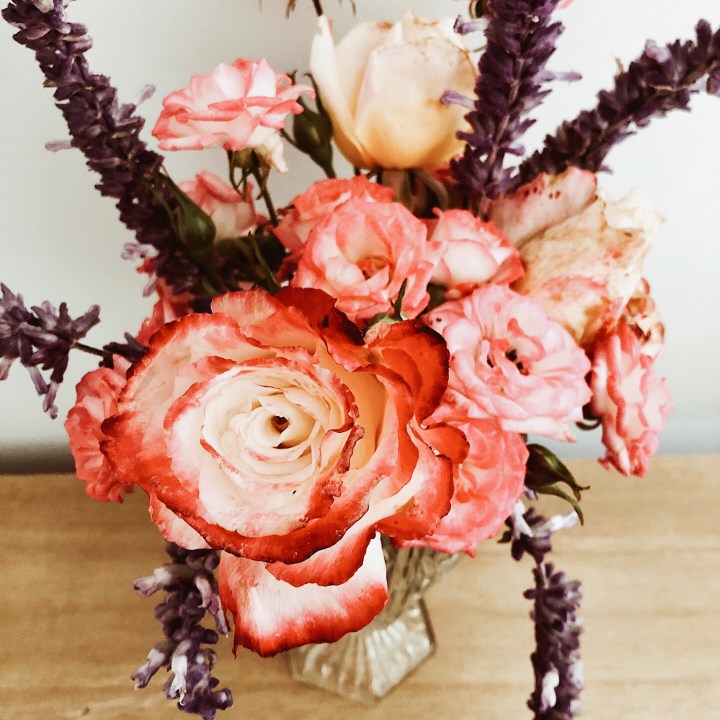 A pink and white posie of roses.