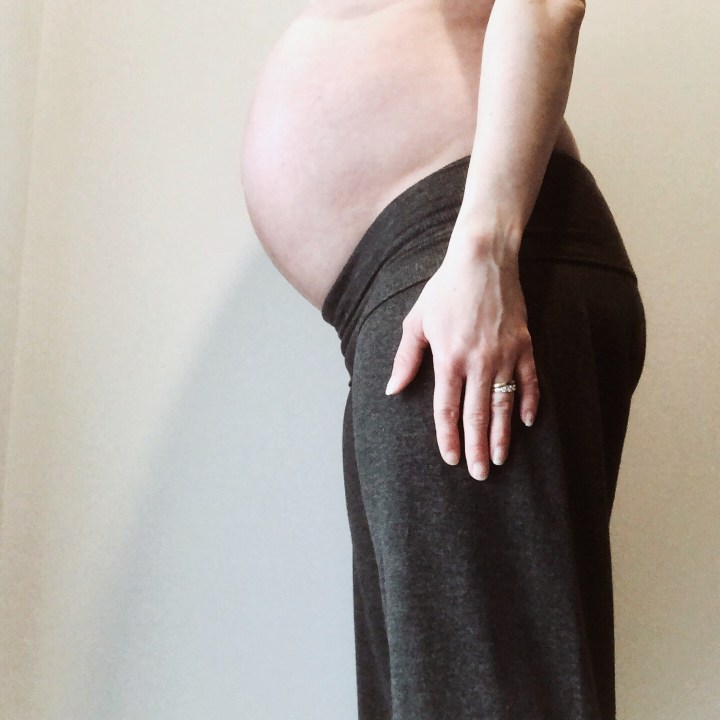 Pregnant woman wearing Ripe jersey lounge pants.