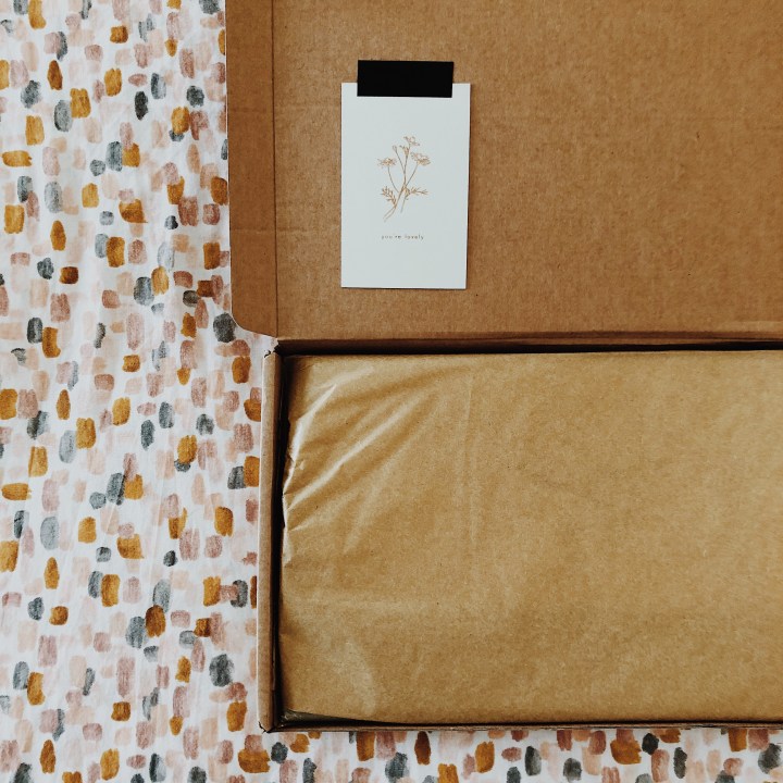 Unwrapping a package from Annie Brougham