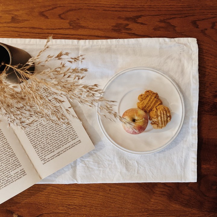 Parmesan and rosemary biscuits on a baking tray ready to go in the oven.
