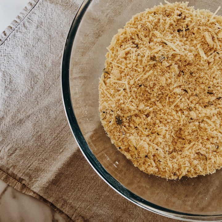 Parmesan and rosemary biscuit mixture in a bowl.