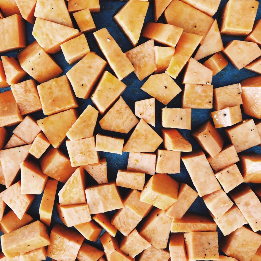 Diced sweet potato on a baking tray,