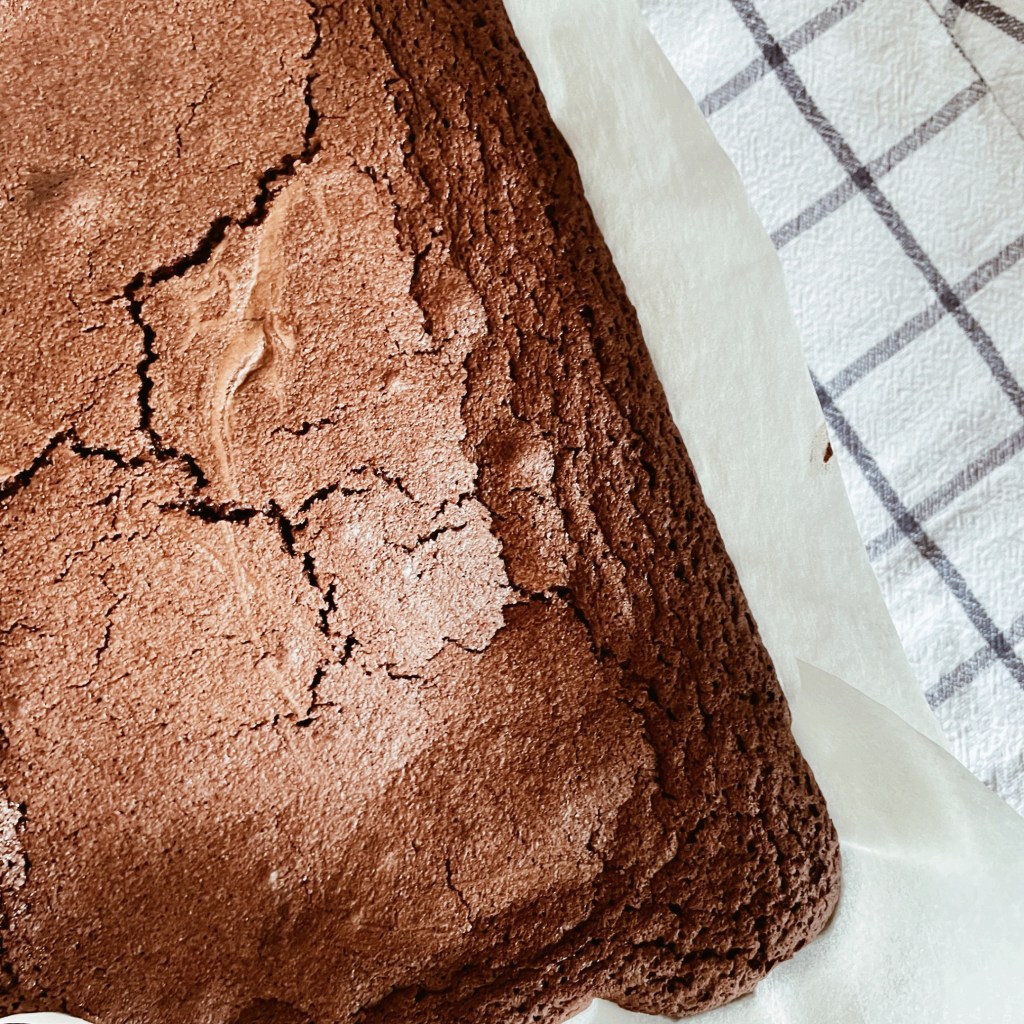 Cooked chocolate brownies in a pan.