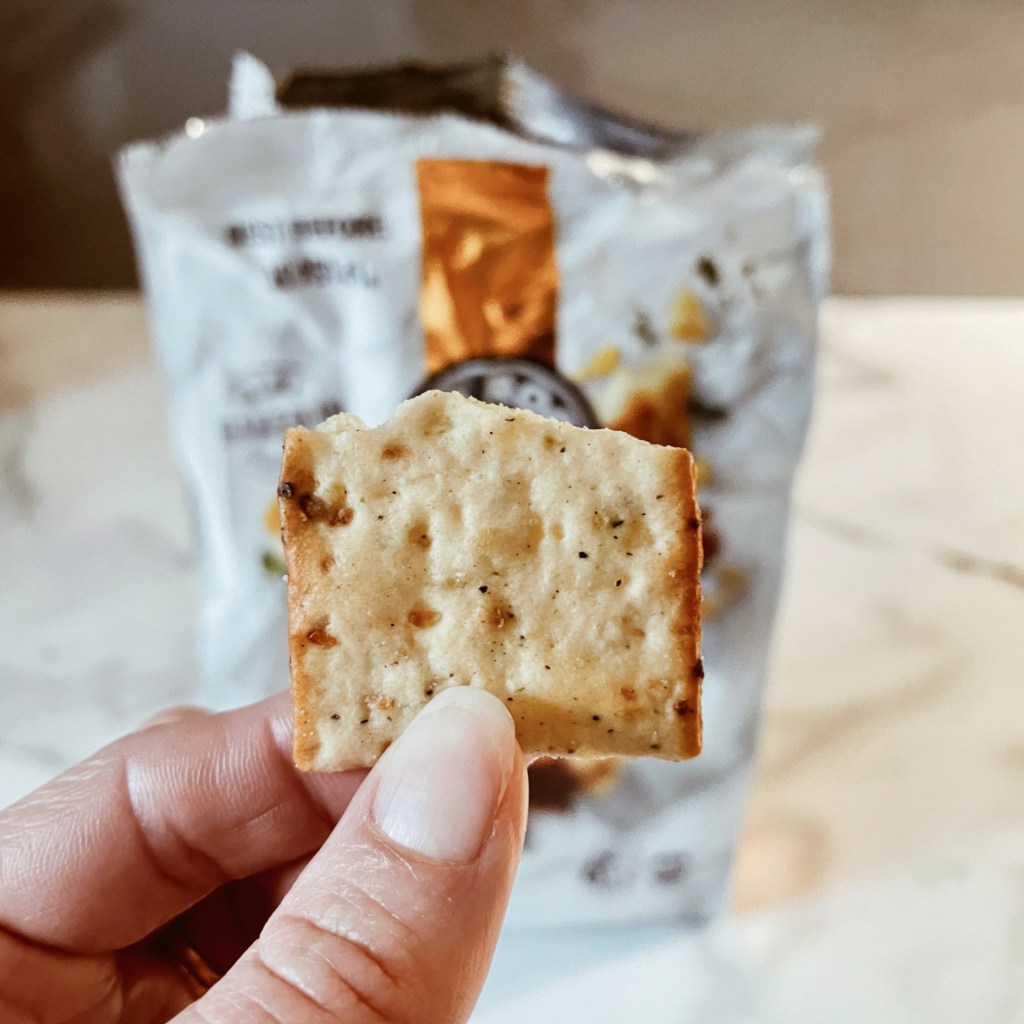 Red Rock Deli aged parmesan and caramelised onion gourmet cracker.