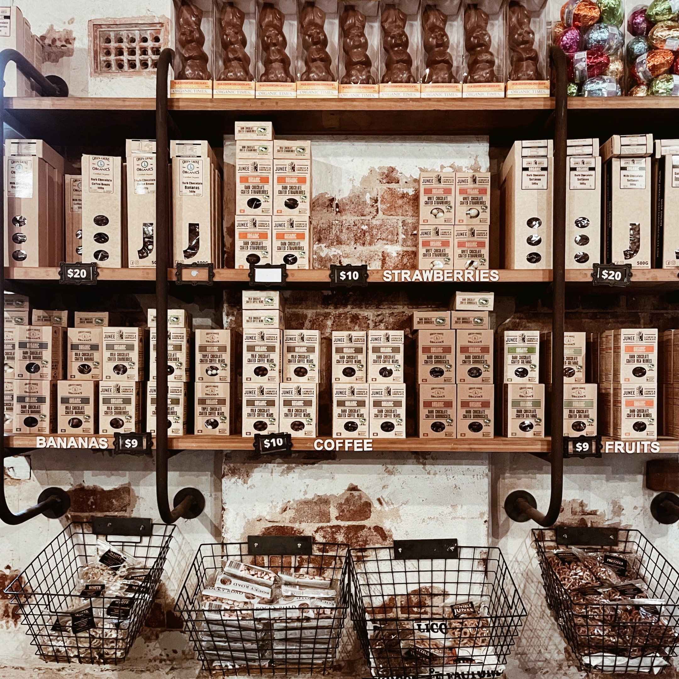 Shelves and baskets full of chocolate at the Junee Licorice and Chocolate Factory, Junee, New South Wales, Australia.